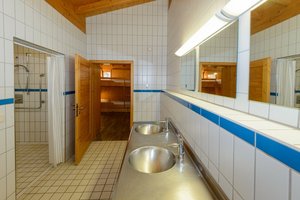 Gemeinschaftsdusche Blockhütte
